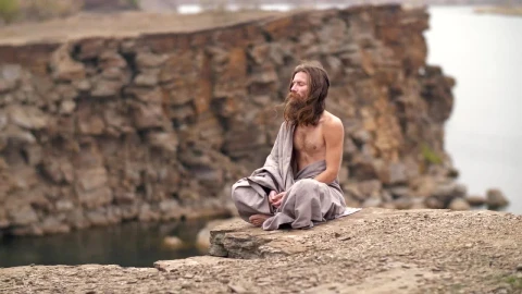 Stock Video Man Meditating On The Hill By The Se Animated Wallpaper - Free Live Wallpaper