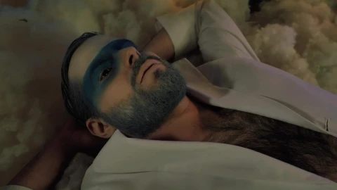 Stock Video Man Lying Down Cold Toned Makeup On Christma Animated Wallpaper - Free Live Wallpaper