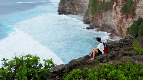 Stock Video Man Looking Out To Sea From A High Clif Animated Wallpaper - Free Live Wallpaper