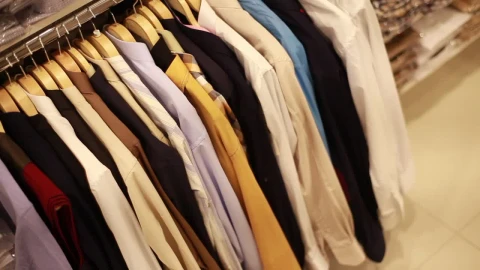 Stock Video Man Looking For A Shirt In A Clothing Sho Animated Wallpaper - Free Live Wallpaper
