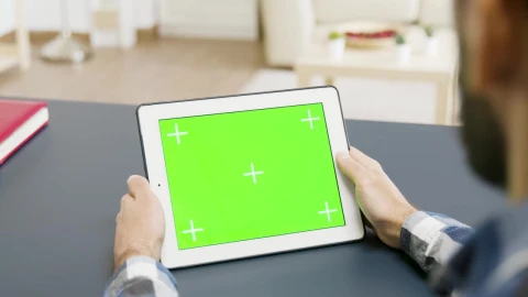 Stock Video Man Looking At A Tablet With Green Scree Animated Wallpaper - Free Live Wallpaper