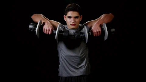 Stock Video Man Lifting Weights While Standin Animated Wallpaper - Free Live Wallpaper
