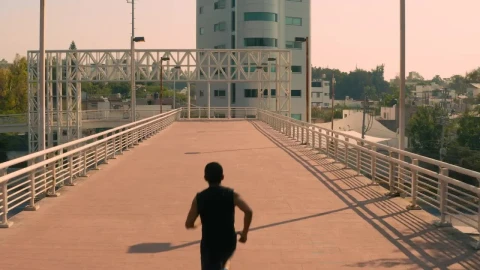 Stock Video Man Jogging On A Pedestrian Bridge In The Cit Animated Wallpaper - Free Live Wallpaper