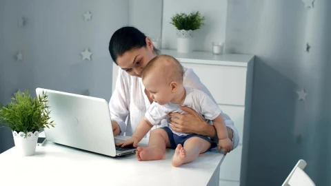 Stock Video Mother Working On Her Laptop With Her Son Live Wallpaper - Free Live Wallpaper