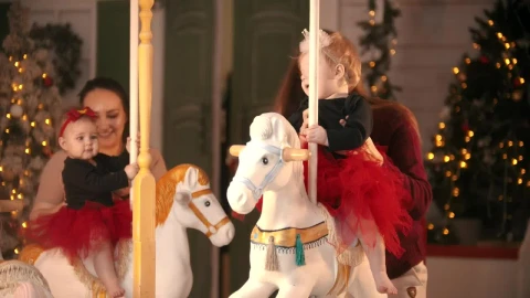 Stock Video Mothers Putting Their Babies On A Carousel Live Wallpaper - Free Live Wallpaper