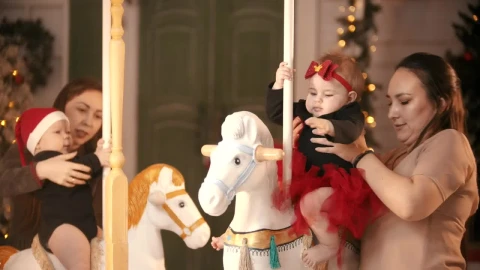 Stock Video Mothers With Their Daughters On A Christmas Carousel Live Wallpaper - Free Live Wallpaper