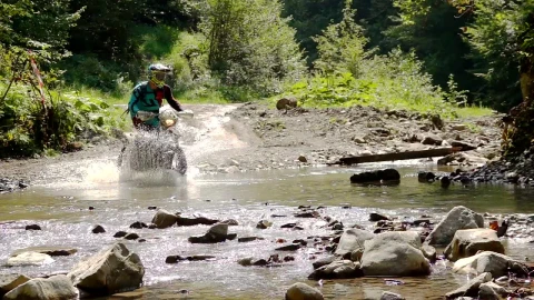 Stock Video Motocross Rider Crosses A River In The Mountain Live Wallpaper - Free Live Wallpaper