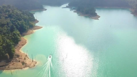 Stock Video Motorboat Sailing In A Bay On A Sunny Day Live Wallpaper - Free Live Wallpaper