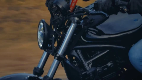 Stock Video Motorcycle And Its Driver Speeding Down A Road Live Wallpaper - Free Live Wallpaper