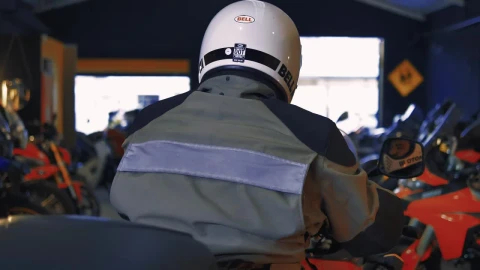 Stock Video Motorcyclist In A Workshop Full Of Motorcycles Live Wallpaper - Free Live Wallpaper