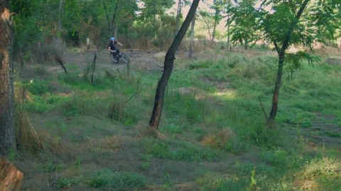Stock Video Mountain Biker Speeding On The Dirt Path Live Wallpaper - Free Live Wallpaper