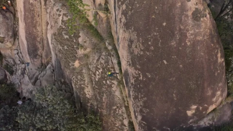Stock Video Mountaineer Descending A Huge Mountain Seen From The Air Live Wallpaper - Free Live Wallpaper