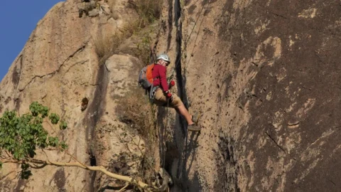 Stock Video Mountaineer Descending A Rocky Mountain Live Wallpaper - Free Live Wallpaper