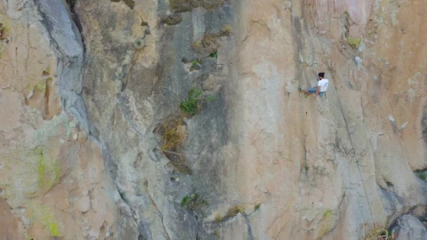 Stock Video Mountaineer Descending From A Large Mountain With A Rope LargeLive Wallpaper - Free Live Wallpaper