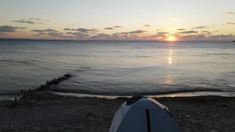 Stock Video Moving Through The Air On A Beach During Sunset Live Wallpaper - Free Live Wallpaper