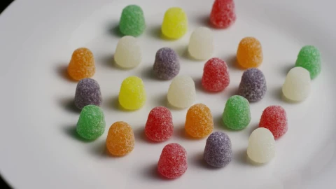 Stock Video Multicolor Gummys Rotating On A Plate Live Wallpaper - Free Live Wallpaper