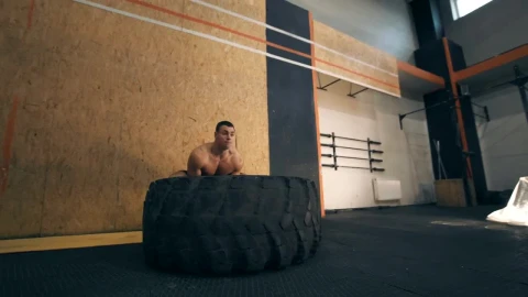 Stock Video Muscular Man Doing Crossfit With A Big Tire Live Wallpaper - Free Live Wallpaper