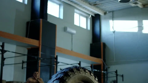 Stock Video Muscular Man Jumping A Tire In The Gym Live Wallpaper - Free Live Wallpaper