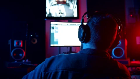 Stock Video Music Producer Monitoring With Headphones In Studio Live Wallpaper - Free Live Wallpaper