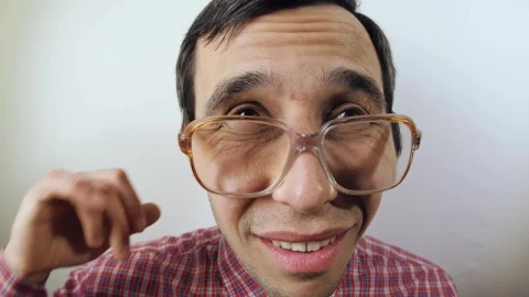 Stock Video Nerd Scratches His Ear Portrait Live Wallpaper - Free Live Wallpaper