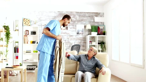 Stock Video Nurse Helps Elderly Woman Stand Up And Walk Live Wallpaper - Free Live Wallpaper
