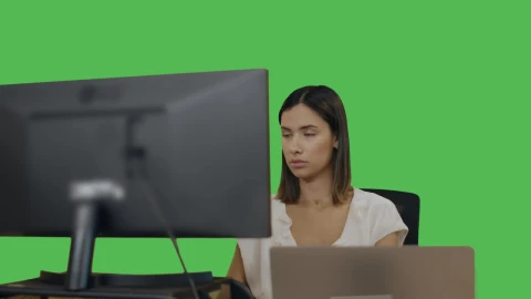 Stock Video Office Woman At Her Desk On A Green Background Live Wallpaper - Free Live Wallpaper