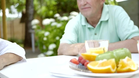 Stock Video Old Couple Holding Hands At The Table Live Wallpaper - Free Live Wallpaper