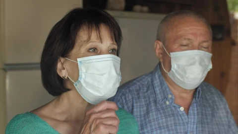 Stock Video Old Couple Taking Off Their Masks At Home Live Wallpaper - Free Live Wallpaper