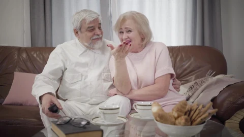 Stock Video Old Couple Watching A Tv Comedy Show Live Wallpaper - Free Live Wallpaper