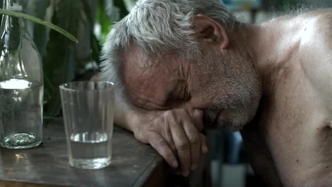 Stock Video Old Shirtless Drunk Man Sleeping On A Table Live Wallpaper - Free Live Wallpaper