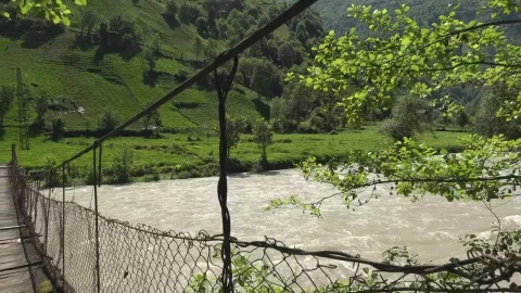 Stock Video Old Suspended Wooden Bridge Over A River Live Wallpaper - Free Live Wallpaper