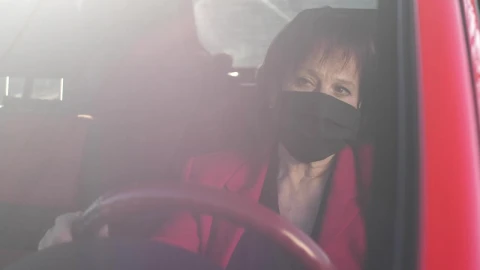 Stock Video Old Woman Wearing Mask While Driving Her Car Live Wallpaper - Free Live Wallpaper
