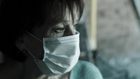 Stock Video Old Woman With Sad Look Wearing Mask Live Wallpaper - Free Live Wallpaper