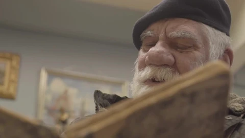 Stock Video Older Man Reading A Book Live Wallpaper - Free Live Wallpaper