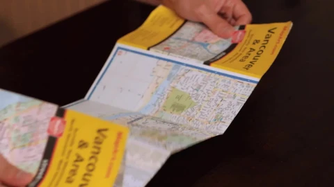 Stock Video Opening A Map On A Table Live Wallpaper - Free Live Wallpaper