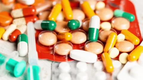 Stock Video Orange And Green Pills On Pharmacy Counter Live Wallpaper - Free Live Wallpaper