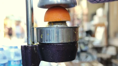 Stock Video Orange Squeezer Used By A Man Live Wallpaper - Free Live Wallpaper