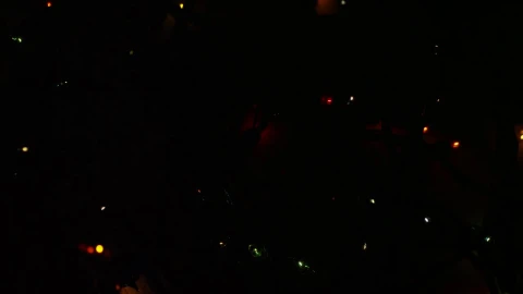 Stock Video Ornamental Christmas Lights In A Dark Room Live Wallpaper - Free Live Wallpaper