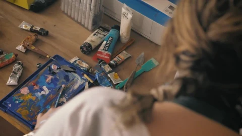 Stock Video Painter Working On An Artwork In Her Home Studio With Live Wallpaper - Free Live Wallpaper