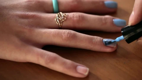 Stock Video Painting Blue Nails On Woman Hand Live Wallpaper - Free Live Wallpaper