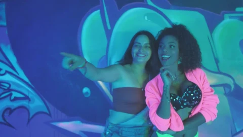 Stock Video Pair Of Girlfriends Laughing Together During A Party Live Wallpaper - Free Live Wallpaper