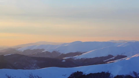 Stock Video Pan Shot Of A Stunning Sunset In Winter Mountains Live Wallpaper - Free Live Wallpaper