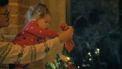 Stock Video Parents And Daughter Putting A Bow On The Top Of Live Wallpaper - Free Live Wallpaper