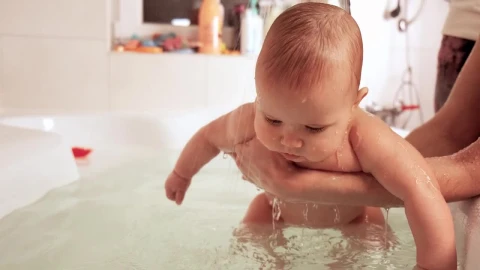 Stock Video Parents Bathing Their Baby In The Tub Live Wallpaper - Free Live Wallpaper