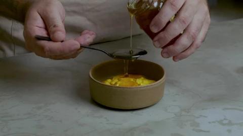 Stock Video Pastry Chef Adding Honey To A Mixture Live Wallpaper - Free Live Wallpaper