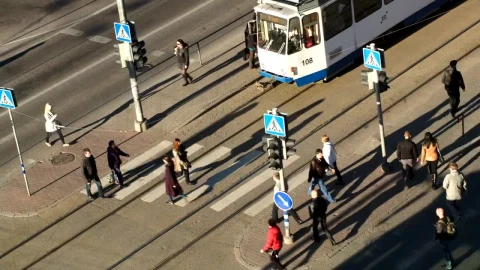 Stock Video Pedestrians Walking By A Tram Live Wallpaper - Free Live Wallpaper