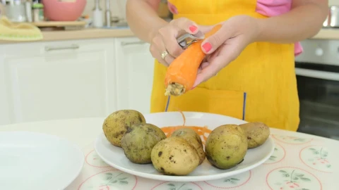 Stock Video Peeling A Carrot In The Kitchen Live Wallpaper - Free Live Wallpaper