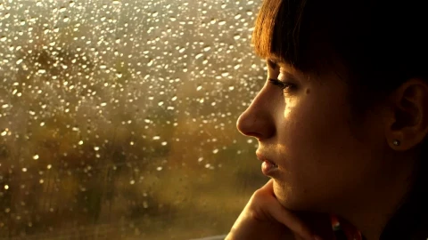 Stock Video Pensive Woman Looking Out Of A Window On A Rainy Live Wallpaper - Free Live Wallpaper