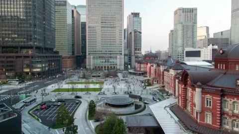 Stock Video People And Cars Moving In A City Of Large Buildings Live Wallpaper - Free Live Wallpaper