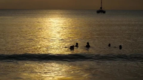 Stock Video People Enjoying The Ocean At Sunset Live Wallpaper - Free Live Wallpaper
